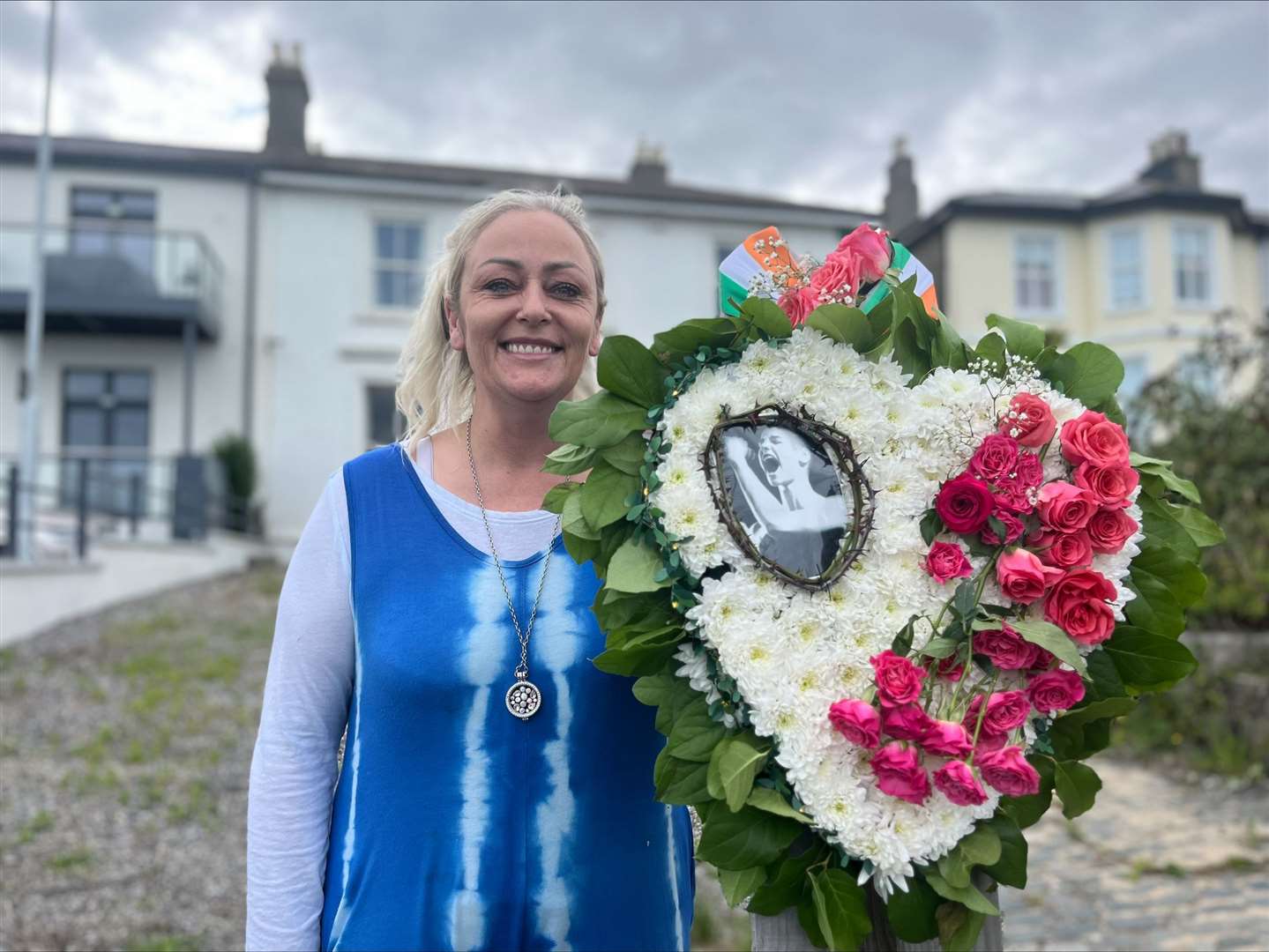 Karen Kehoe with a wreath she designed for Sinead O’Connor (Claudia Savage/PA)