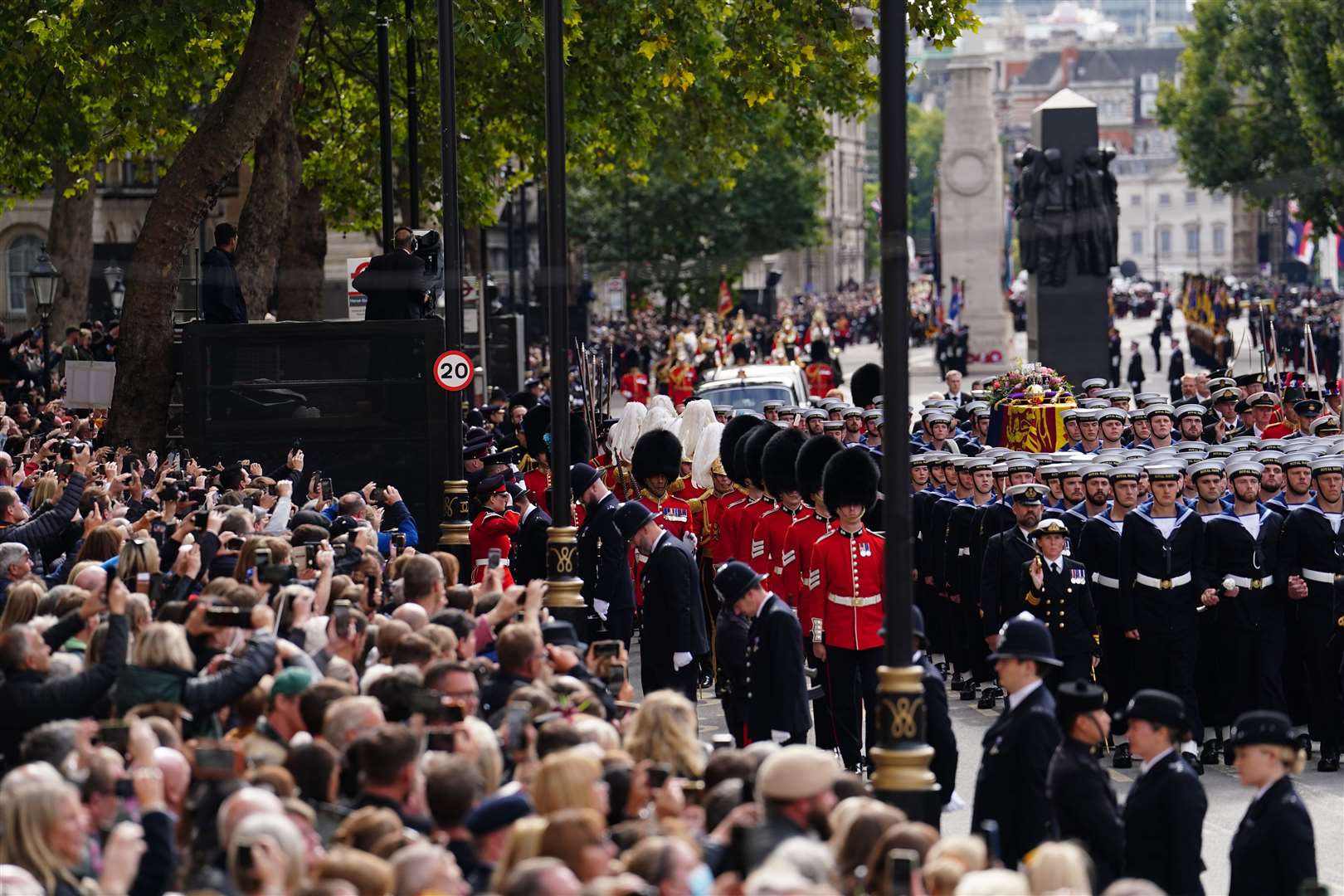 Crowds watch the Queen’s funeral procession (David Davies/PA)