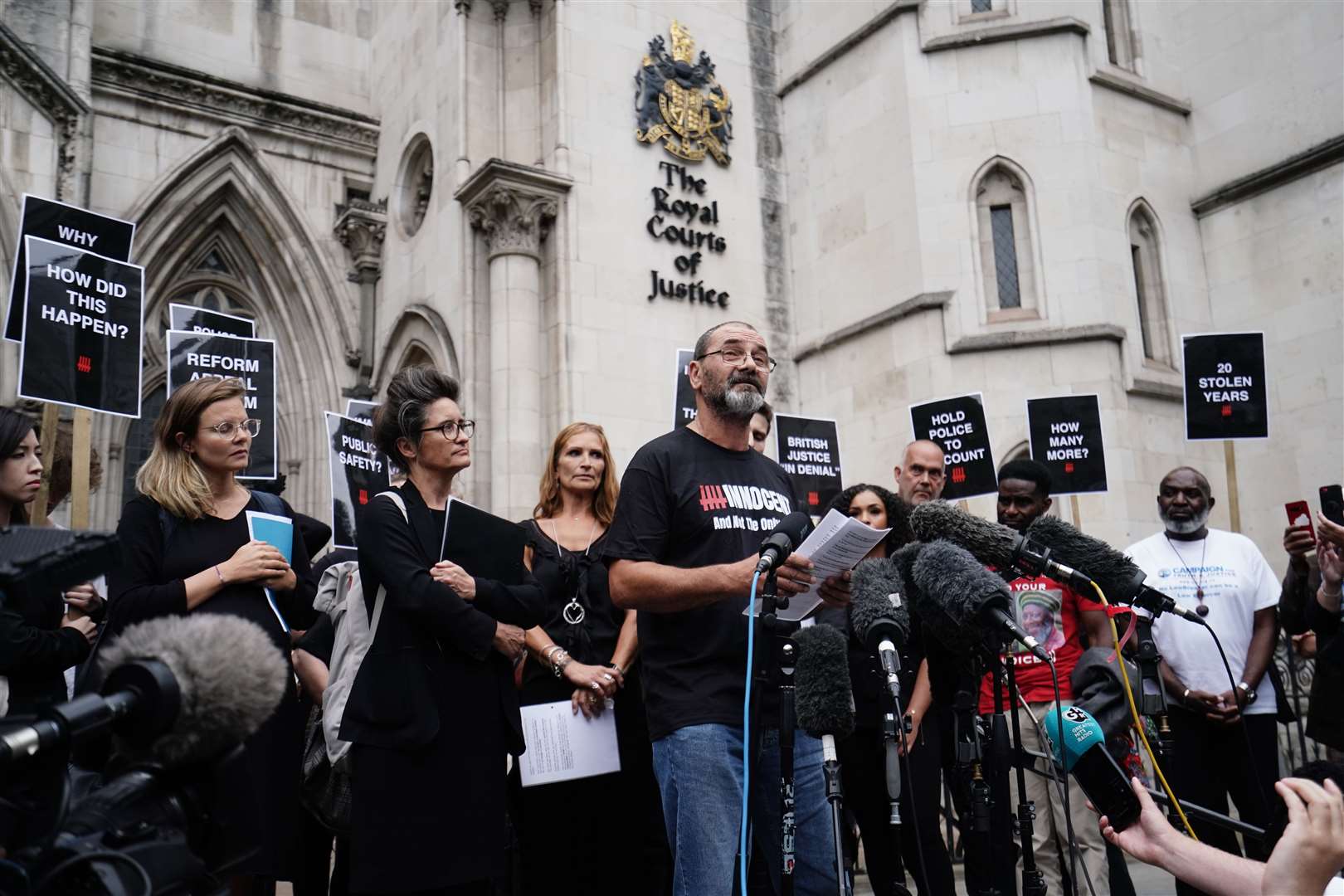 Andrew Malkinson reads a statement outside the Royal Courts of Justice after being cleared by the Court of Appeal (Jordan Pettitt/PA)