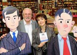 Paul and Diane Browning with their new self help book and the characters from the book Stuart (left) and Frank.