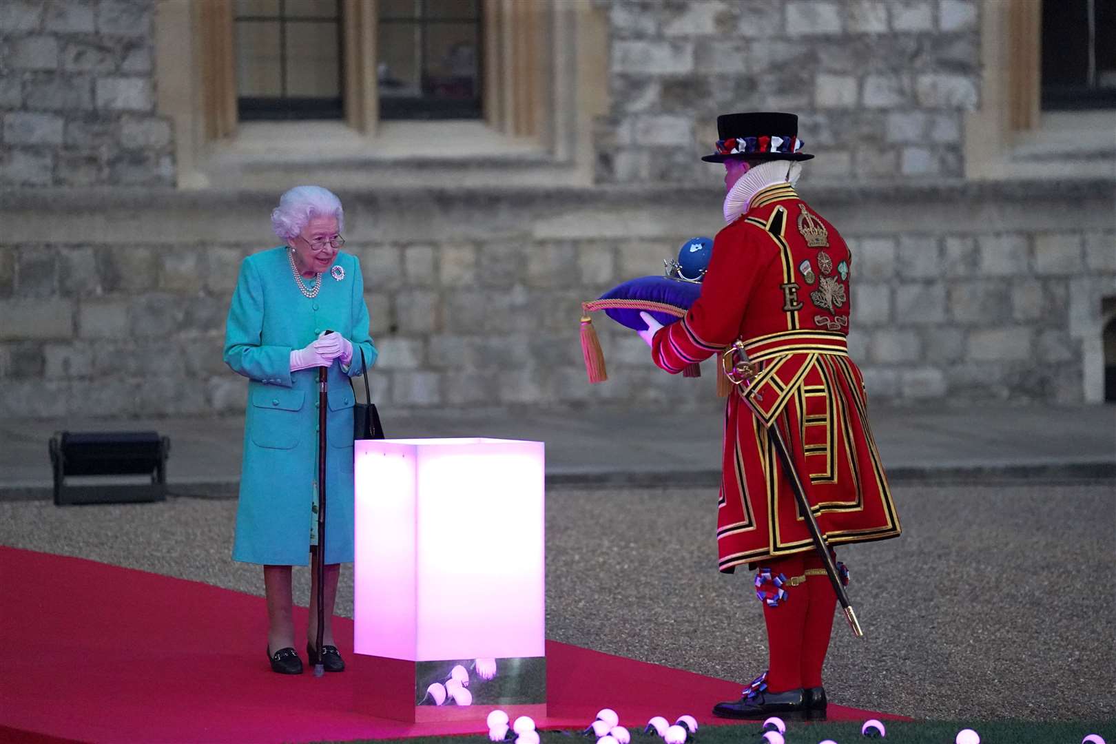 The Queen symbolically leading the lighting of the principal Jubilee beacon at Windsor Castle (Steve Parsons/PA)