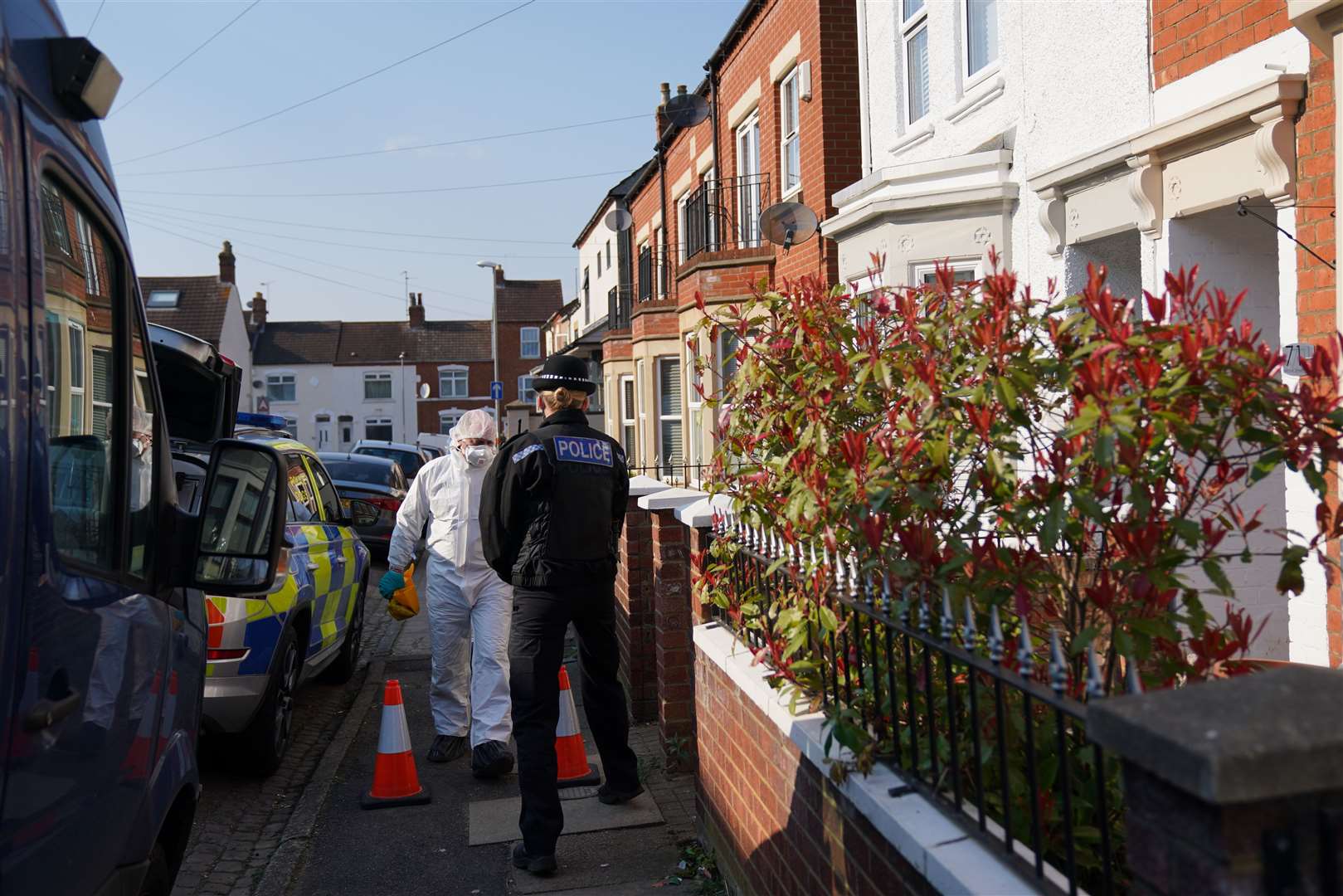 Forensic officers at Beal’s home in March last year (Jacob King/PA)
