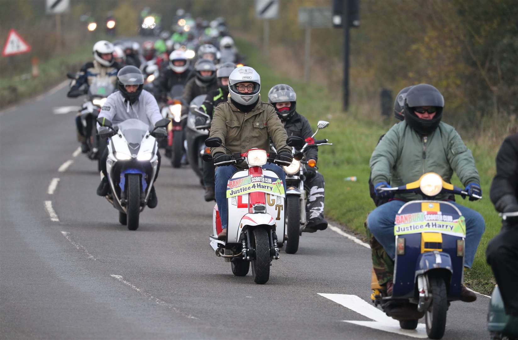 A motorbike convoy follows Harry Dunn’s last ride in Brackley as a tribute to the teenager (Andrew Matthews/PA)