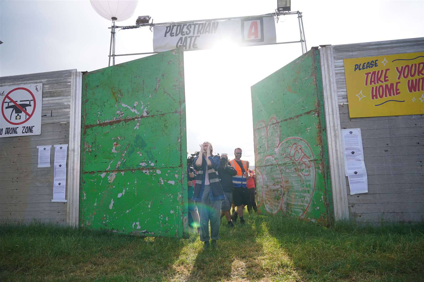 Emily Eavis opens the gates on the first day of the Glastonbury Festival at Worthy Farm in Somerset (Yui Mok/PA)