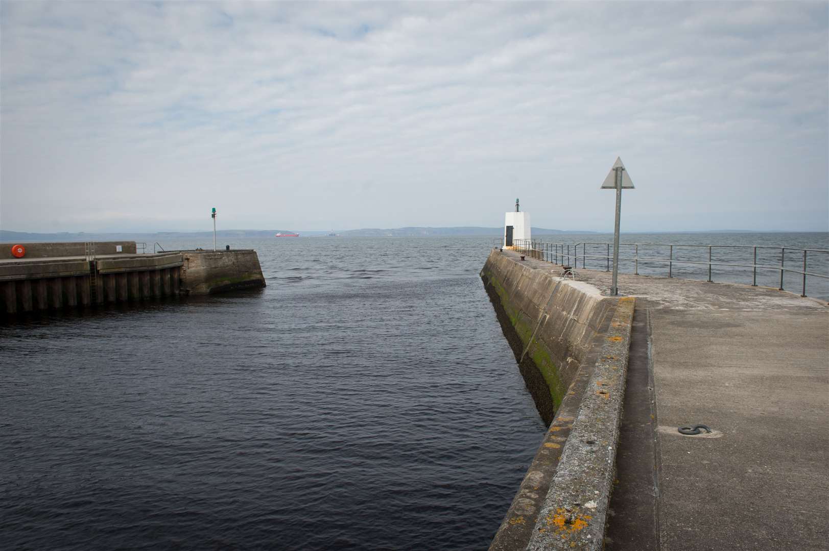 Two paddleboarders were taken to Nairn harbour after getting into difficulty at sea.