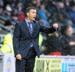 Jim McIntyre's Ross County held Hearts 1-1 at Tynecastle.