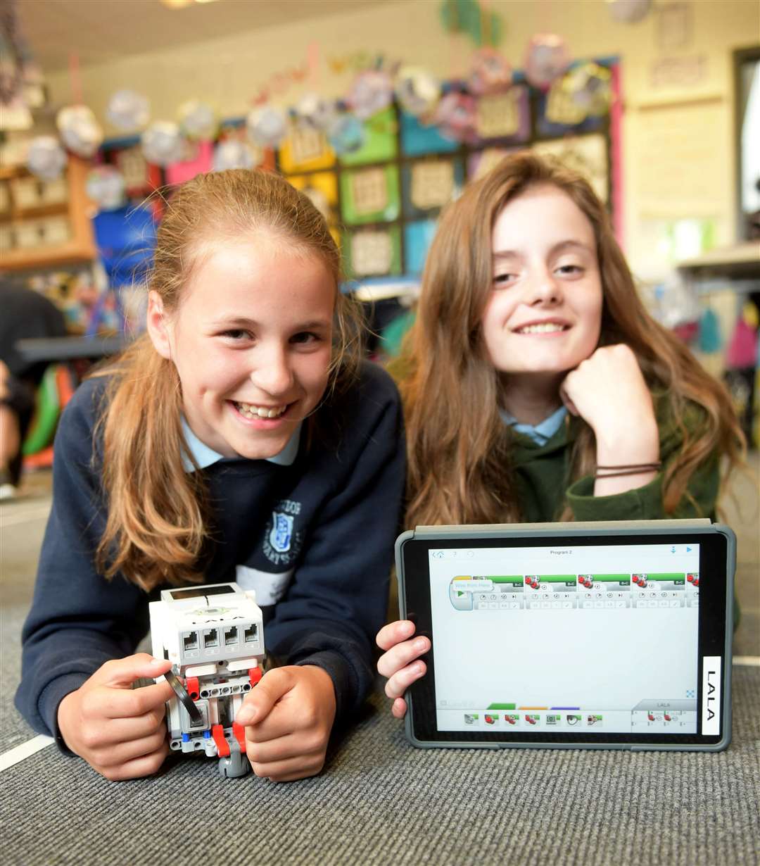 Iona MacArthur and Rhiannon Wilson programming robots using an iPad...Picture: Callum Mackay. Image No. 044154.