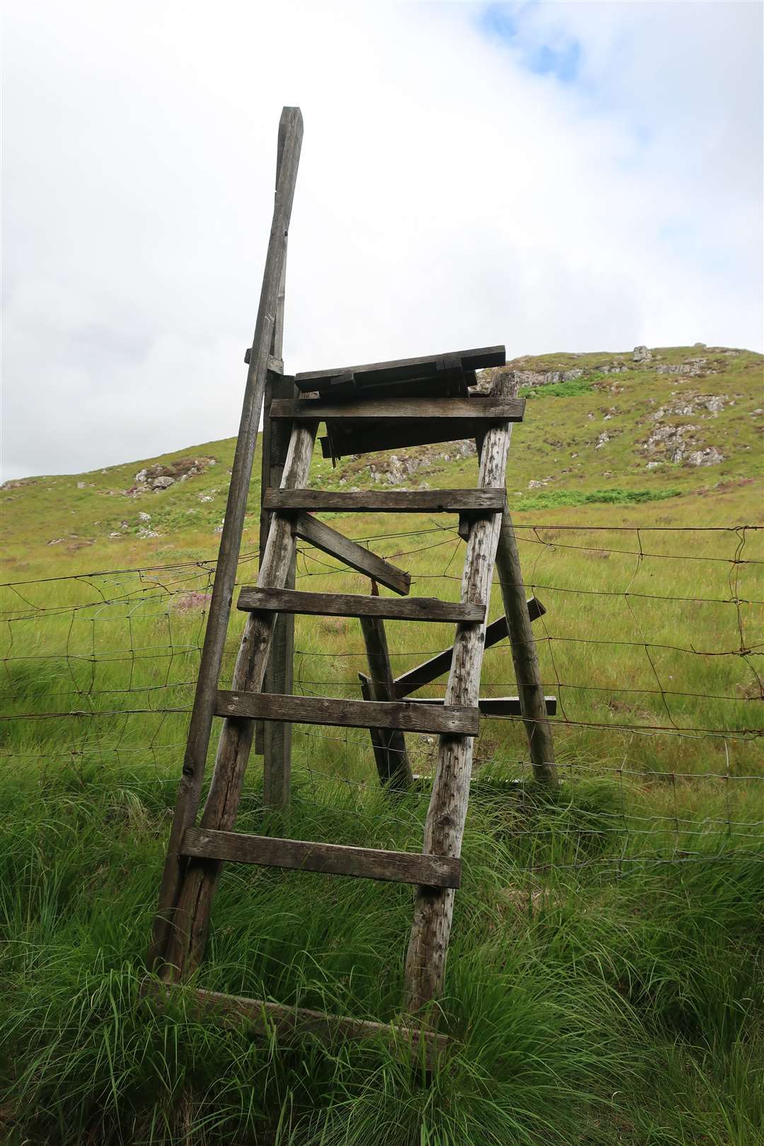 A broken stile makes for an interesting access point to the open hillside.