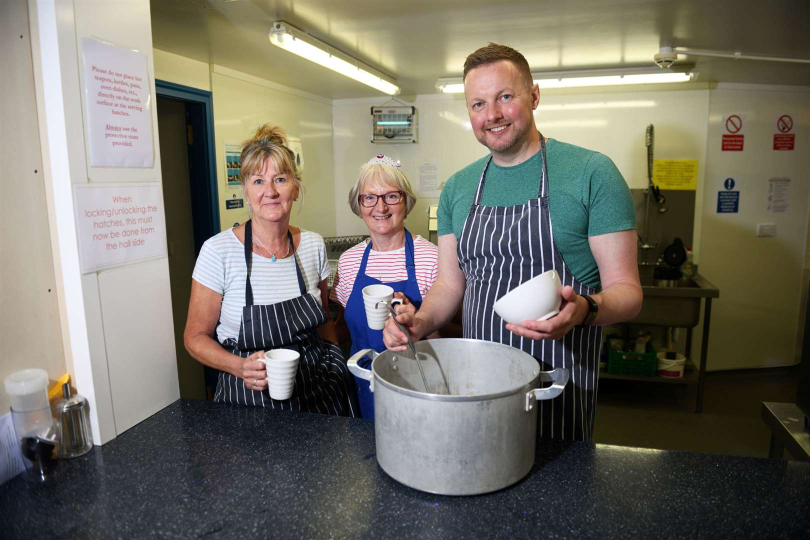 Norma MacKenzie, Ann Henderson and Al Edwards prepare a nourishing meal at Inverness Foodstuff.