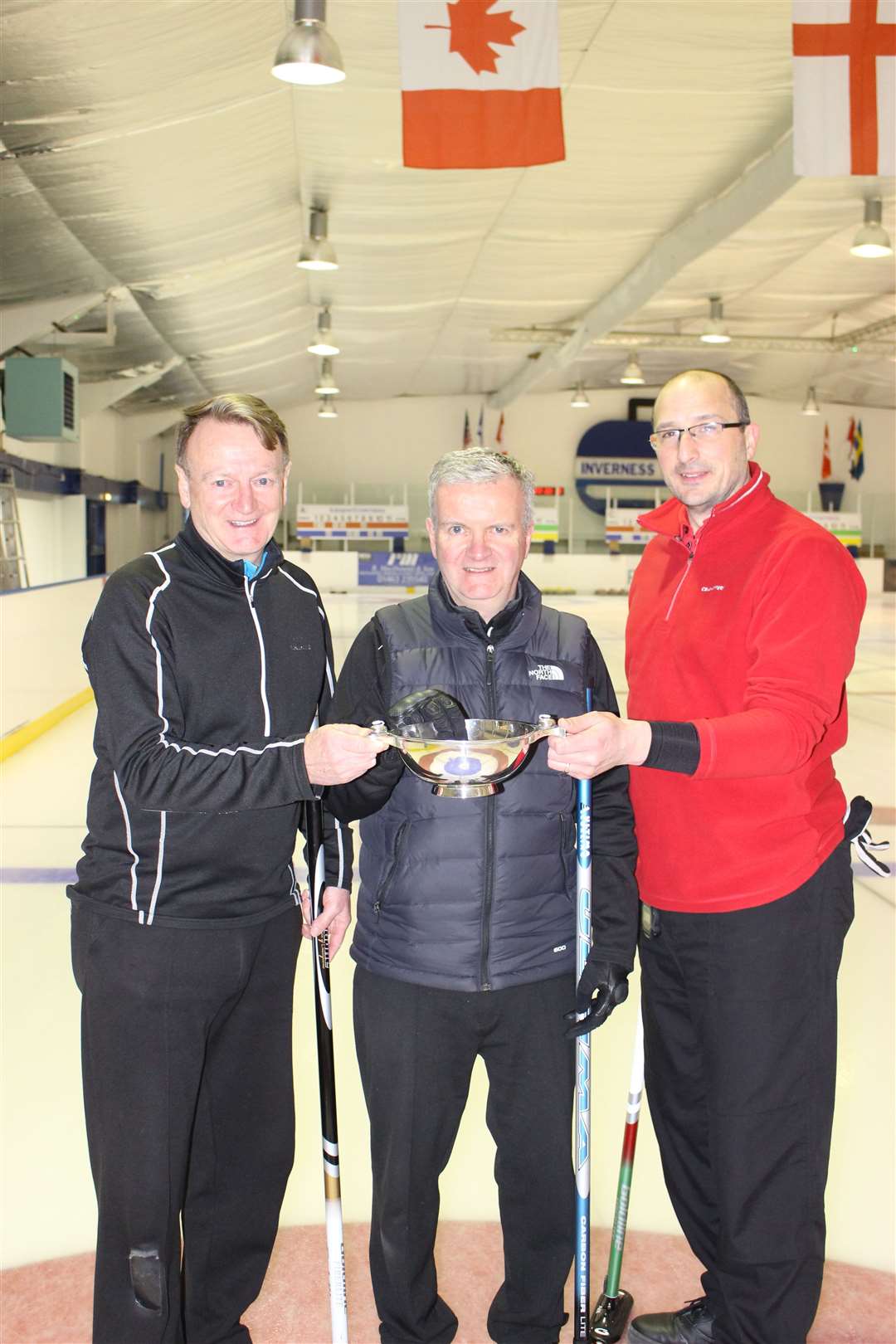 Inverness Super League Division 2 curling winners, The Thomson Rink brothers Brian (left) and Graeme (centre) with third player Gary McAra. Their fourth league winning team player Jim Brown was not at the ice rink.