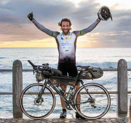 Mark Beaumont celebrates the end of his record-breaking African journey.