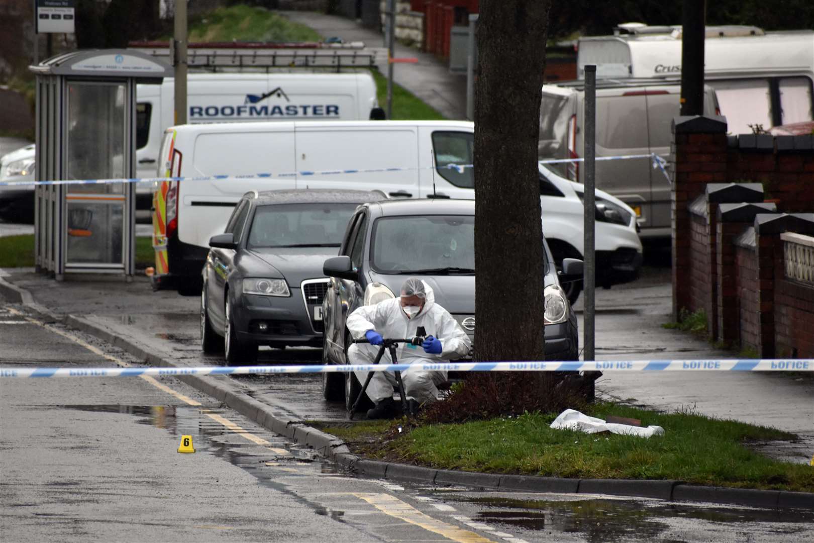 Police in Pensnett Road after the alleged double murder last year (Matthew Cooper/PA)
