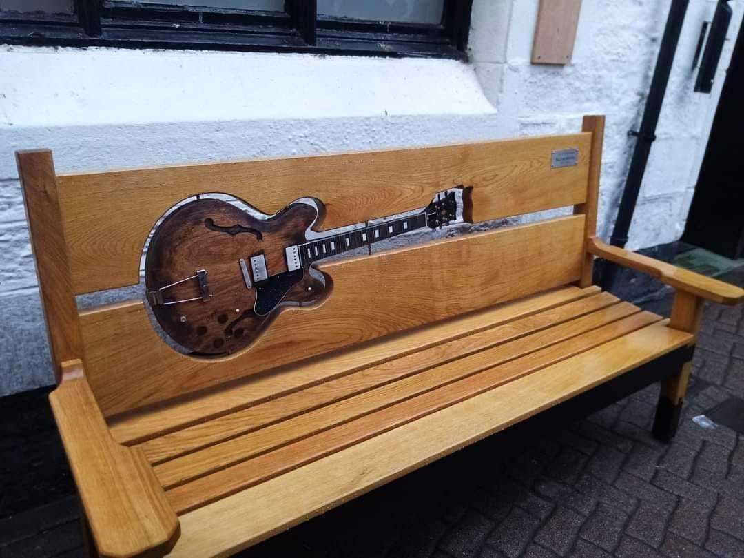 Billy's bench - the scuplted artwork incorporating one of the musician's own guitars