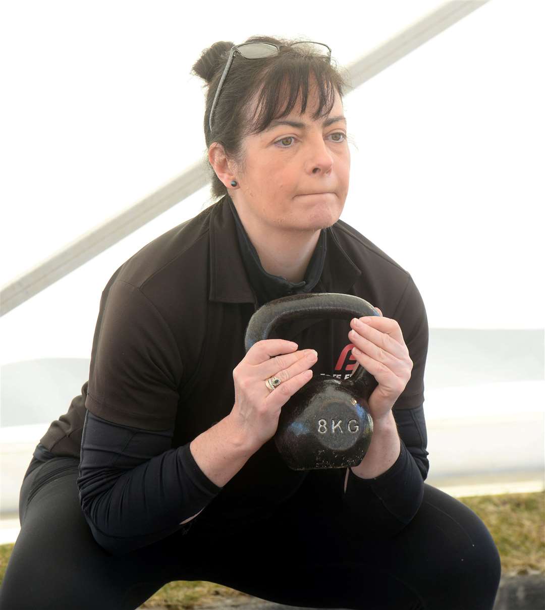 Thanks to a donation from neigbouring business North of Scotland Marquees the Jacobite Boxing Club in Nairn will run outdoor sessions..Fiona Morrison tries out the kettle bells..Picture: Gary Anthony..