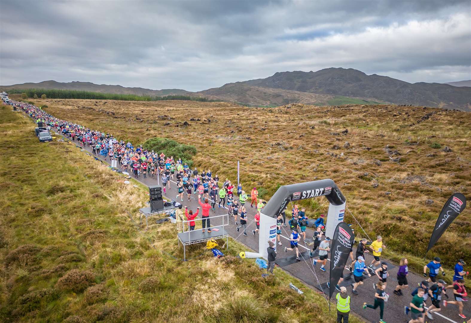 Loch Ness Marathon gets under way high above the loch, beyond Whitebridge