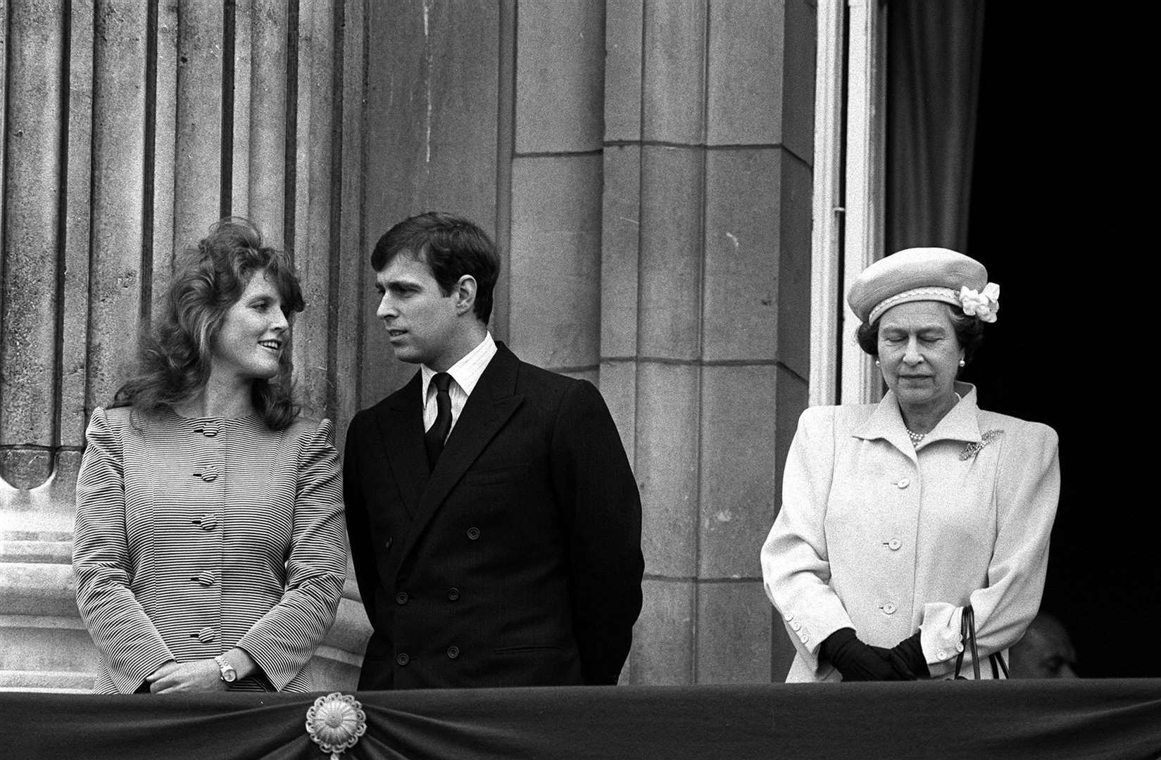Sarah Ferguson and Andrew on the balcony with the then Queen (Archive/PA)