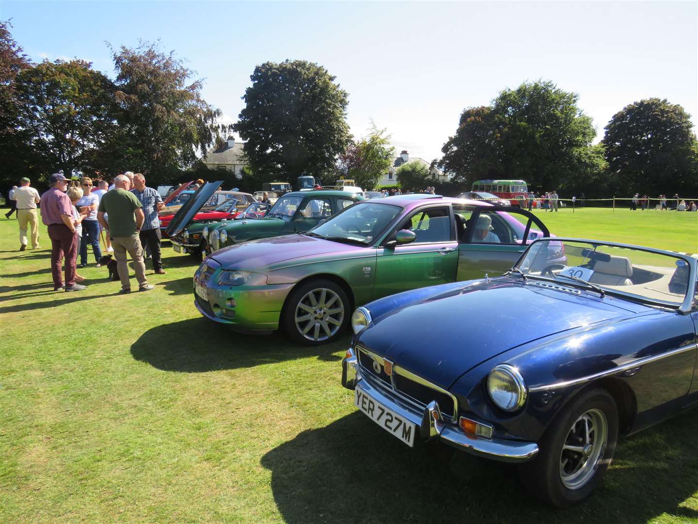 MGB Roadster next to a more modern MG.