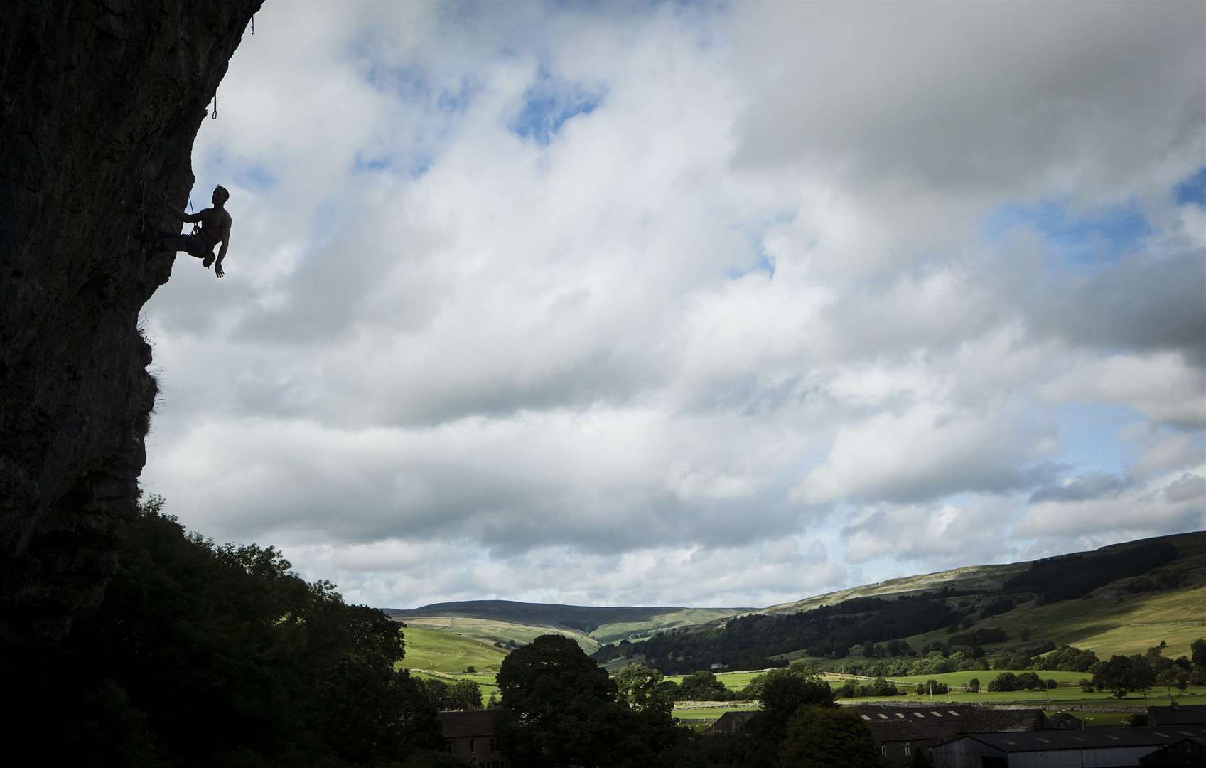 Kilnsey Crag is one of the best-known landmarks in the Yorkshire Dales and one of the national park’s Big Three limestone rock faces (Danny Lawson/PA)