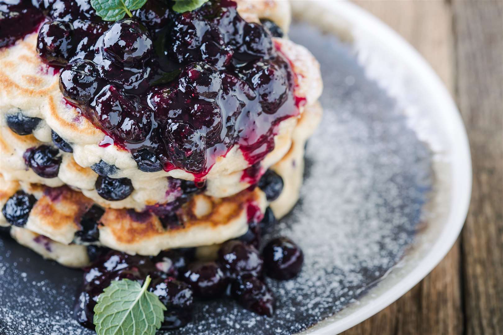 Bursting with blueberries, these pancakes make a filling breakfast.