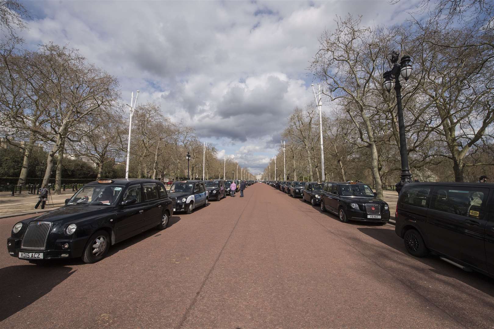 Black London taxi cabs line The Mall near Buckingham Palace to pay tribute to the Duke of Edinburgh (Ian West/PA)