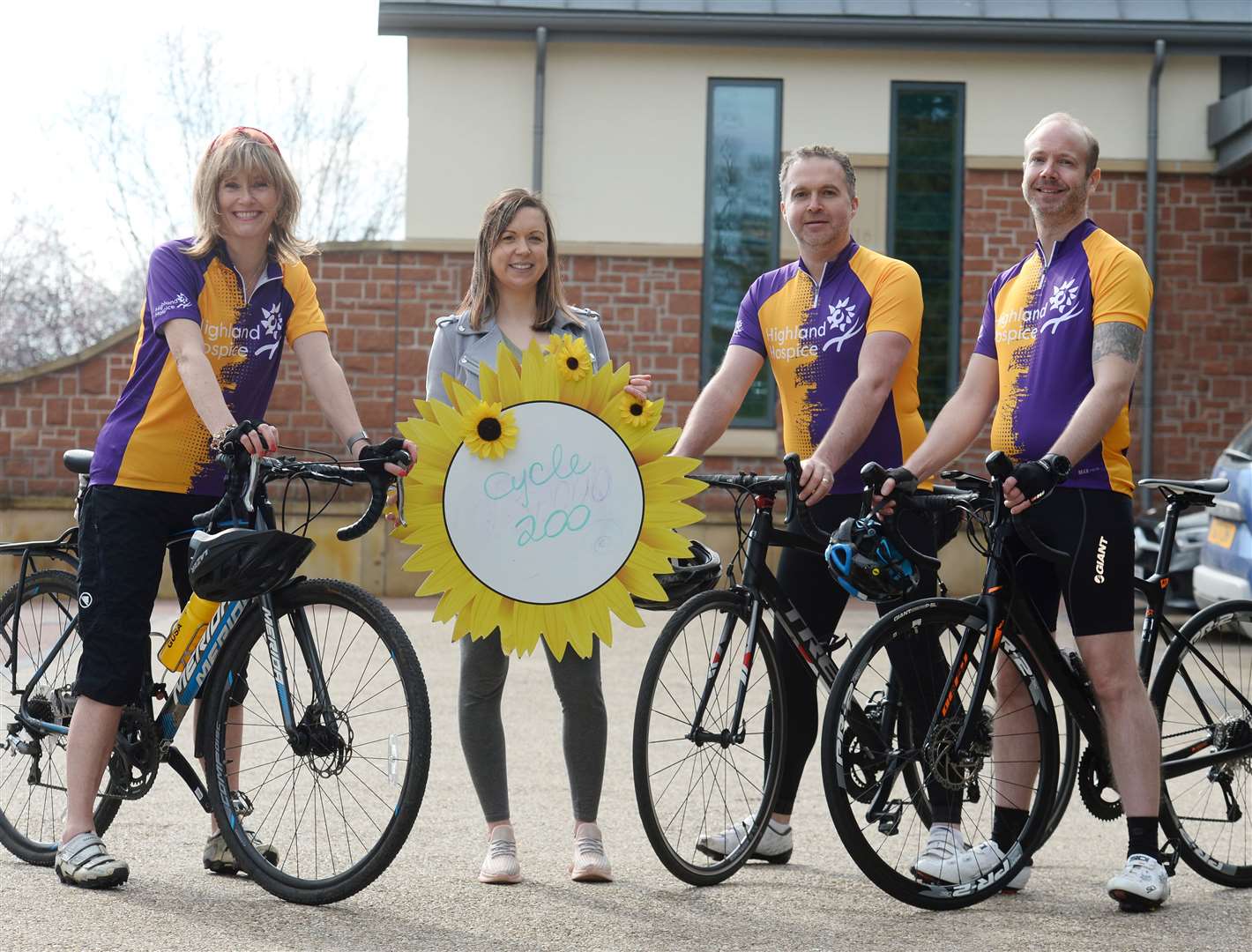 Carrie MacDonald of the Hospice with willing volunteers Nicky Marr, Steve Barron and Paul Robinson. Picture: Gary Anthony