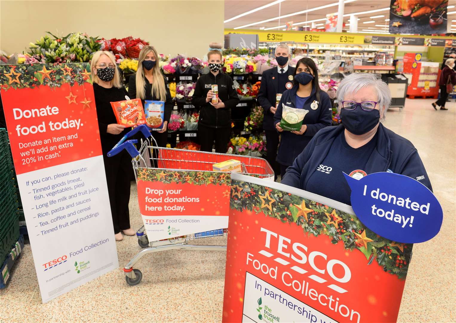 Food collection at Tesco Extra Inshes,colleagues with Tesco community champion Shona Patience(right) ...Picture: Gary Anthony..