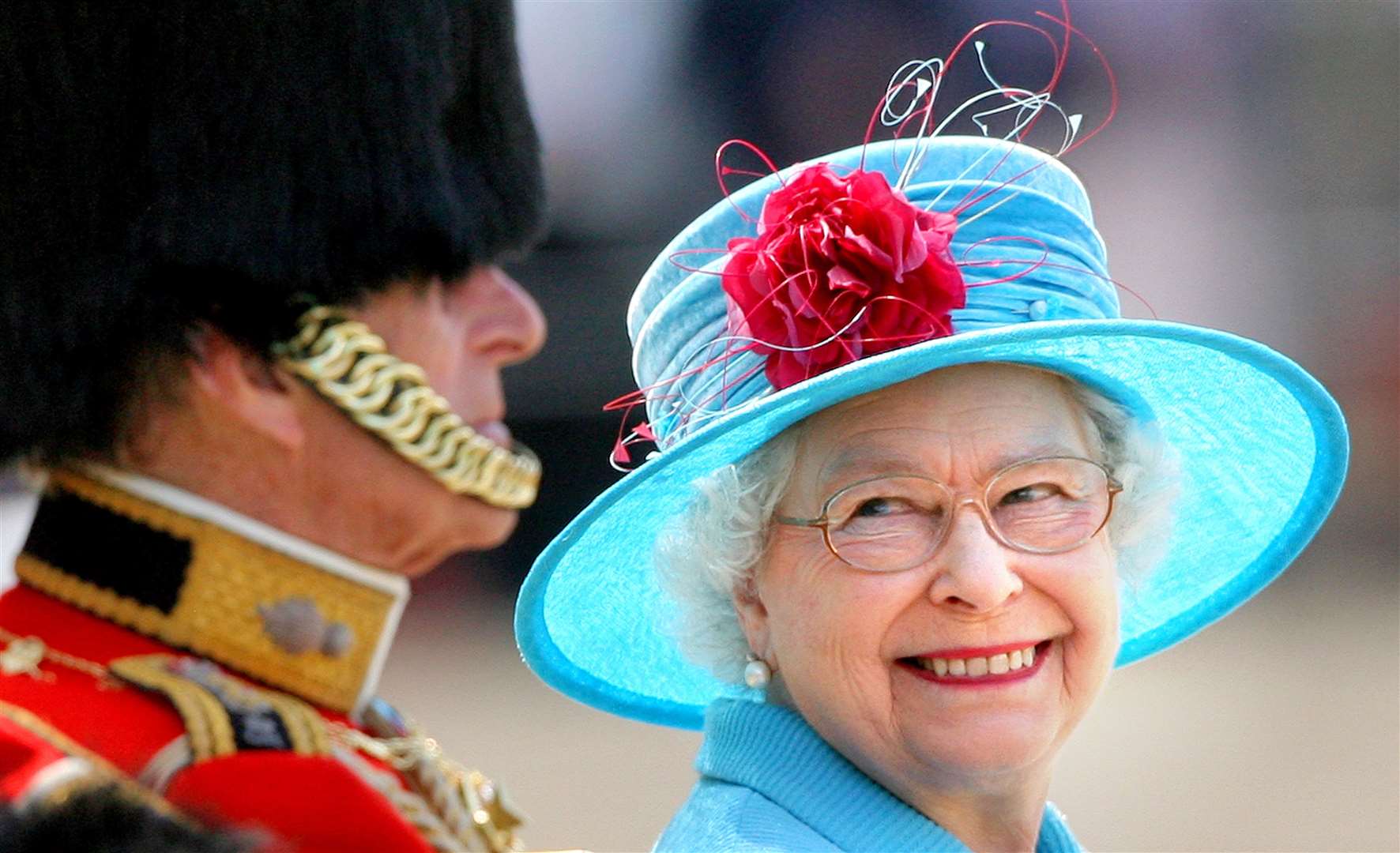 The late Queen smiling at Prince Philip on Horse Guards Parade during the annual Trooping the Colour parade in 2009 (Lewis Whyld/PA)