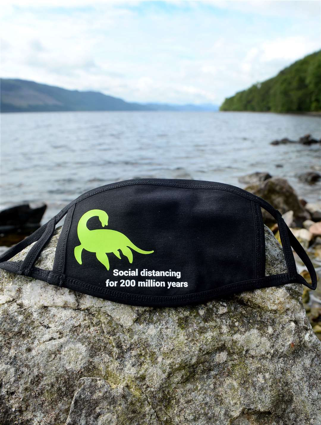 Willie Cameron with his Nessie facemask on banks of Loch Ness..Picture: Gary Anthony..
