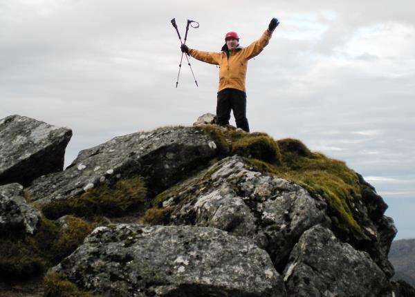 Peter Evans celebrates getting to the summit of his 282nd Munro, A’ Mhaighdean in Fisherfield.