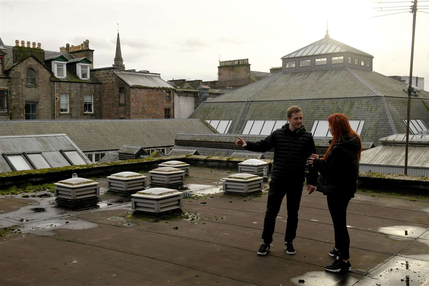 Taran and Kirsty Campbell on the roof of the building. Picture: James Mackenzie.