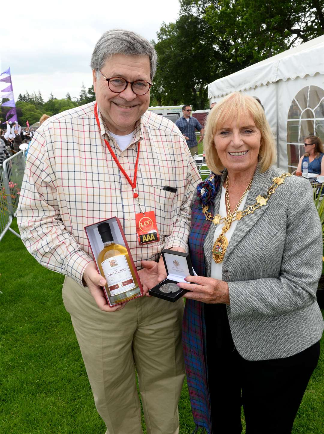 William Barr (United States Attorney General) surprise visitor along with 5 Secret service personal, a keen piper since the age of 6 and thoroughly enjoying the days events, with Provost Helen Carmichael who presented him with a Bottle of Inverness Town House 11 year old Malt Whiskey. Picture: Alasdair Allen