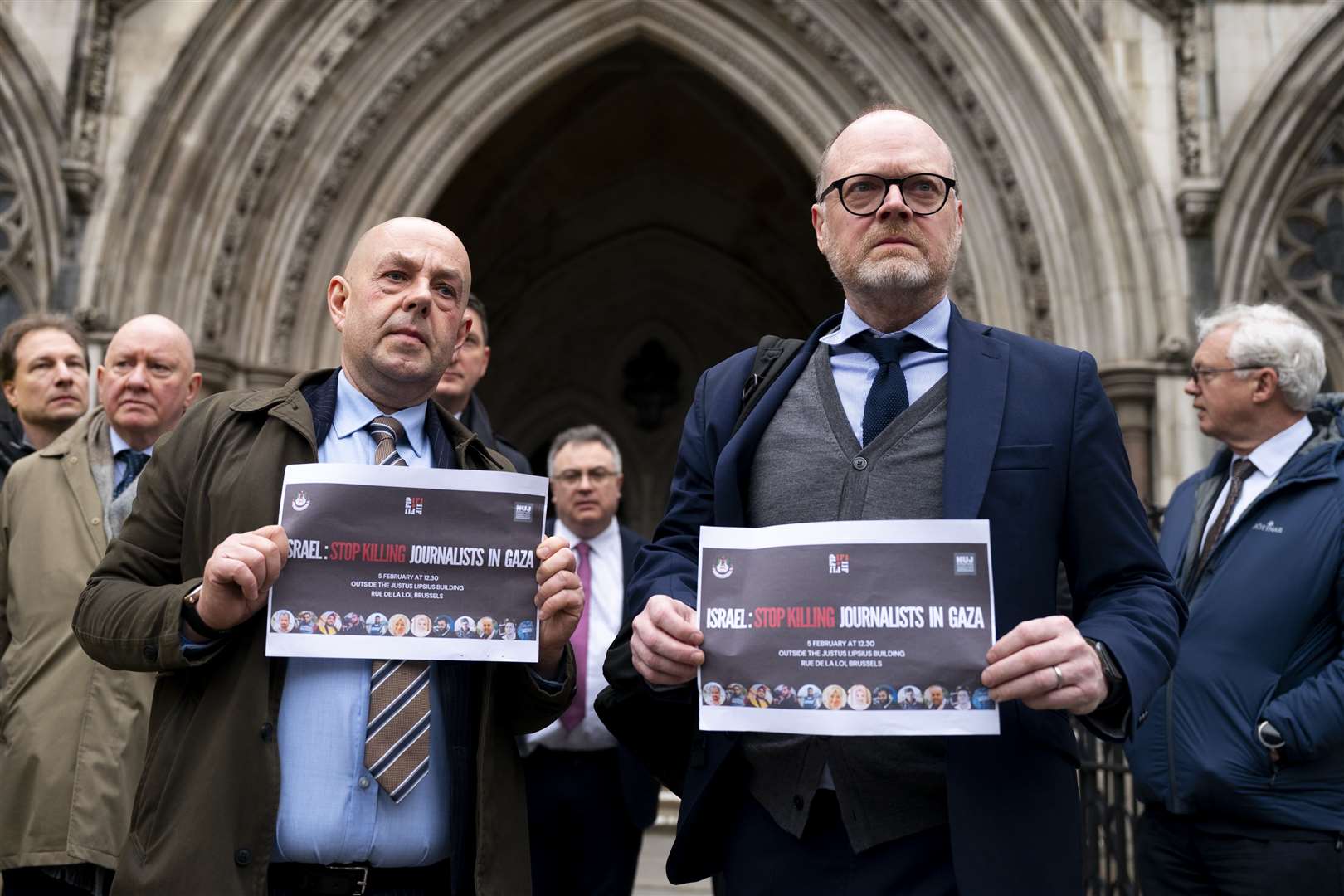 Journalists Barry McCaffrey and Trevor Birney outside the Royal Courts of Justice ahead of the specialist tribunal hearing (Jordan Pettitt/PA)