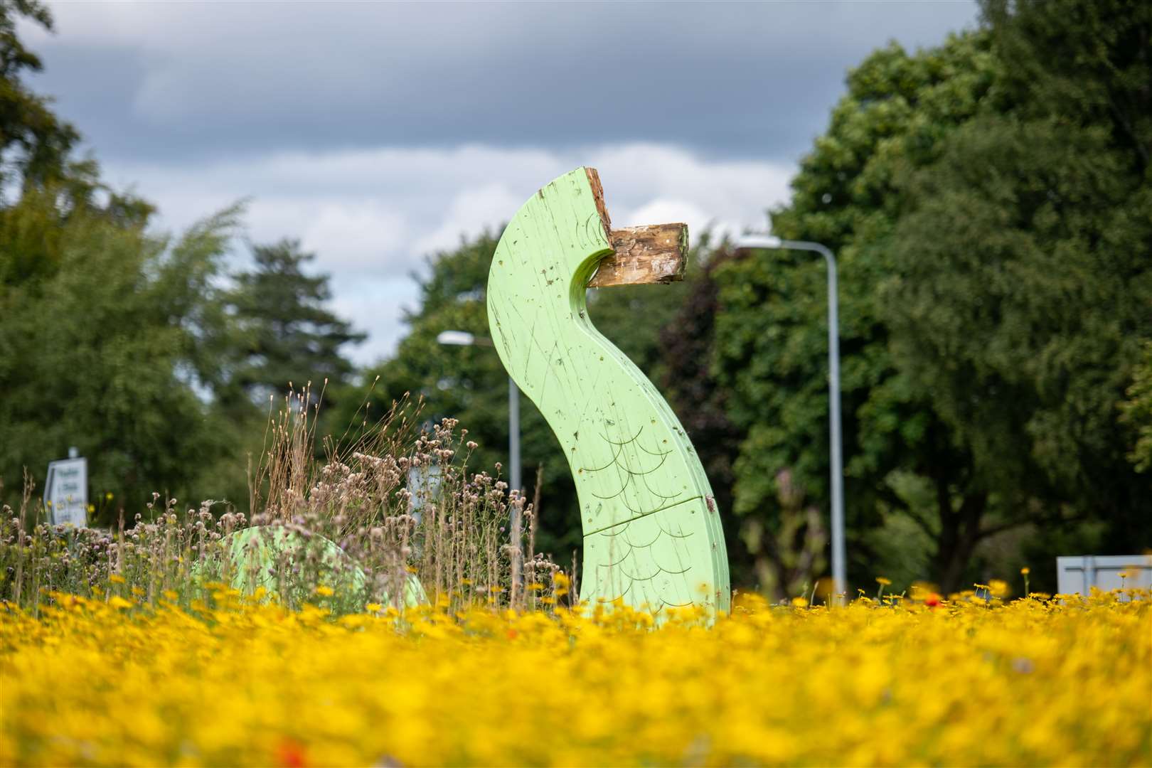 Nessie’s head is missing from the wooden feature at Dores Road roundabout. Picture: Callum Mackay.