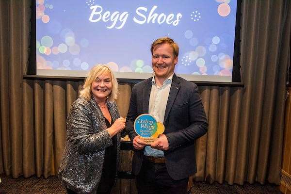Gaven Begg receives the Real Living Wage Award on behalf of Beggs Shoes. Picture: Chris Watt Photography.