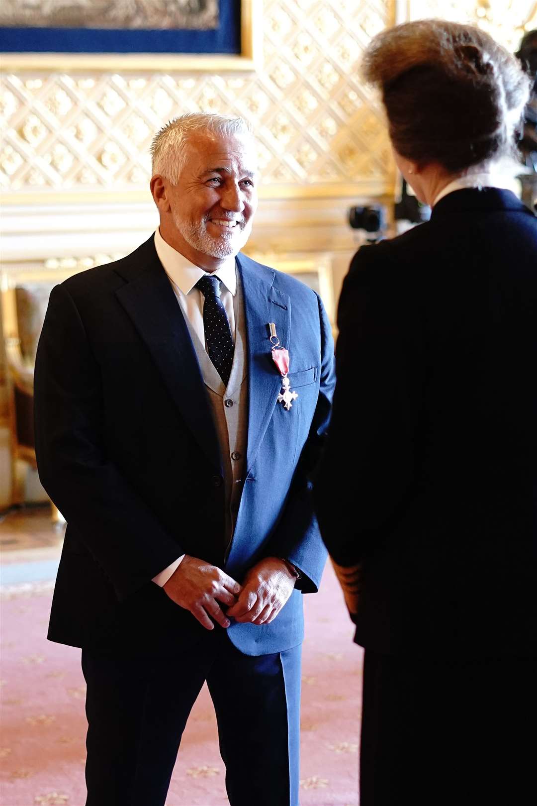 Paul Hollywood smiles as he talks to the Princess Royal during the ceremony (Aaron Chown/PA)
