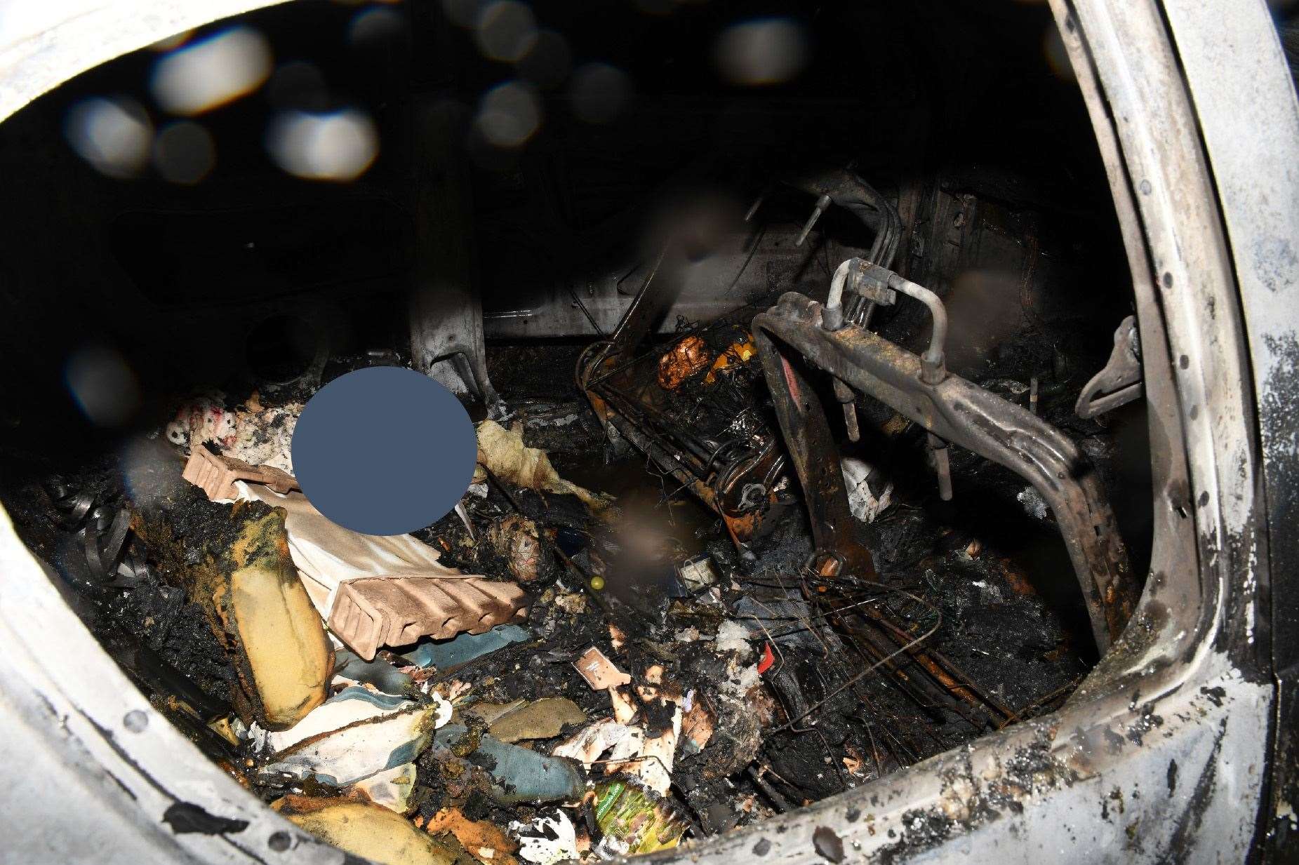 Photo of a placenta found wrapped in a towel on the back seat of the burnt-out Peugeot 206 (Metropolitan Police/PA)