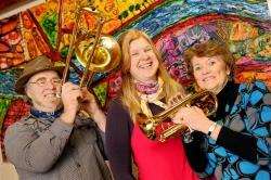 Getting in the mood for jazz are organisers Robb Ellen, Ruth Fisher and Elsie Normington.