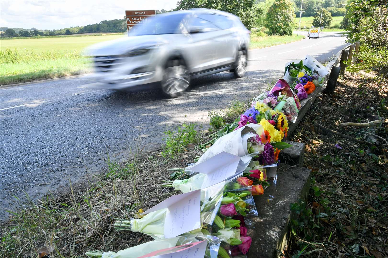 Floral tributes have been left to the four men who died (Ben Birchall/PA)