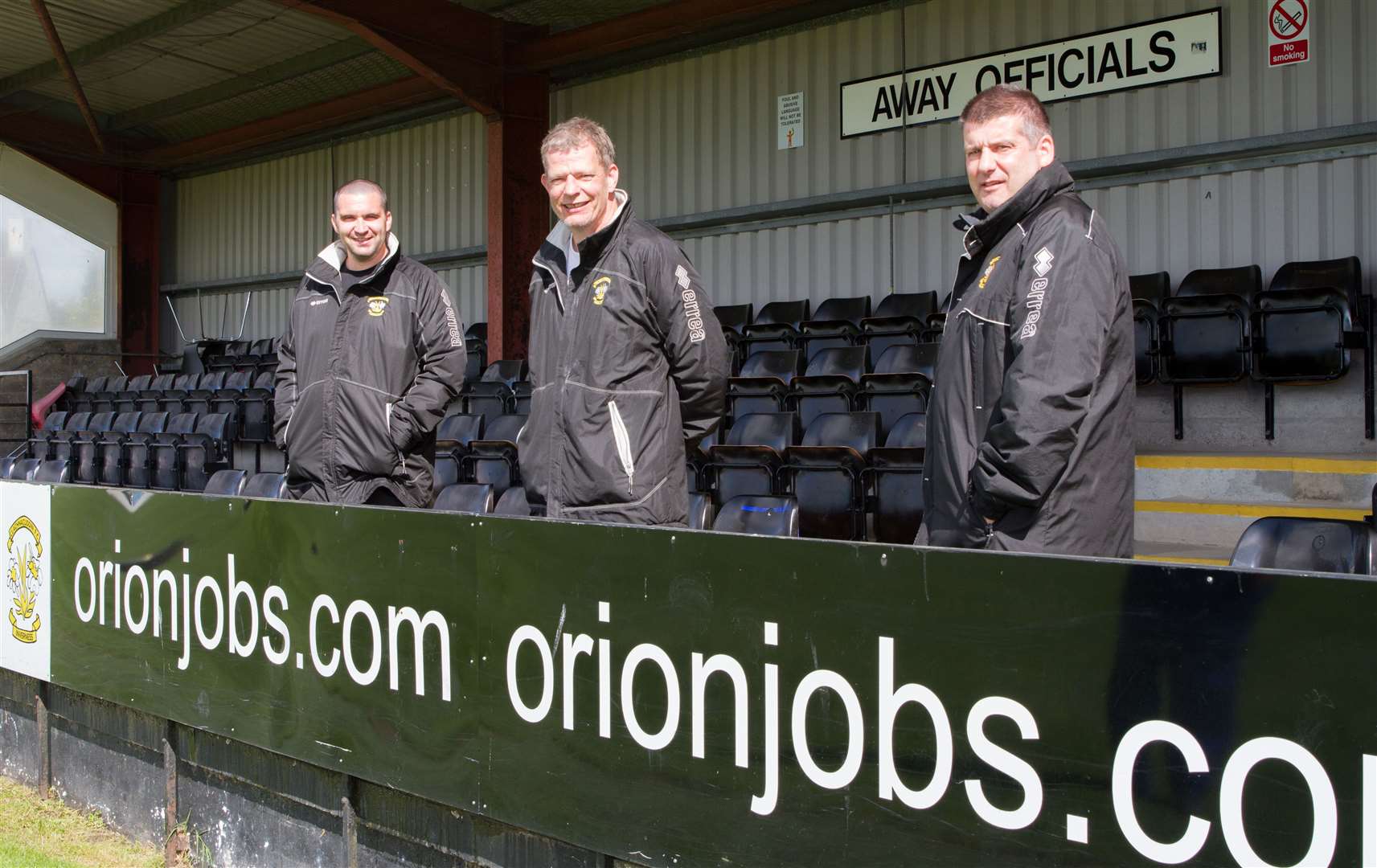 Sandy McLeod (centre) with new coaches. Pic by Donald Cameron