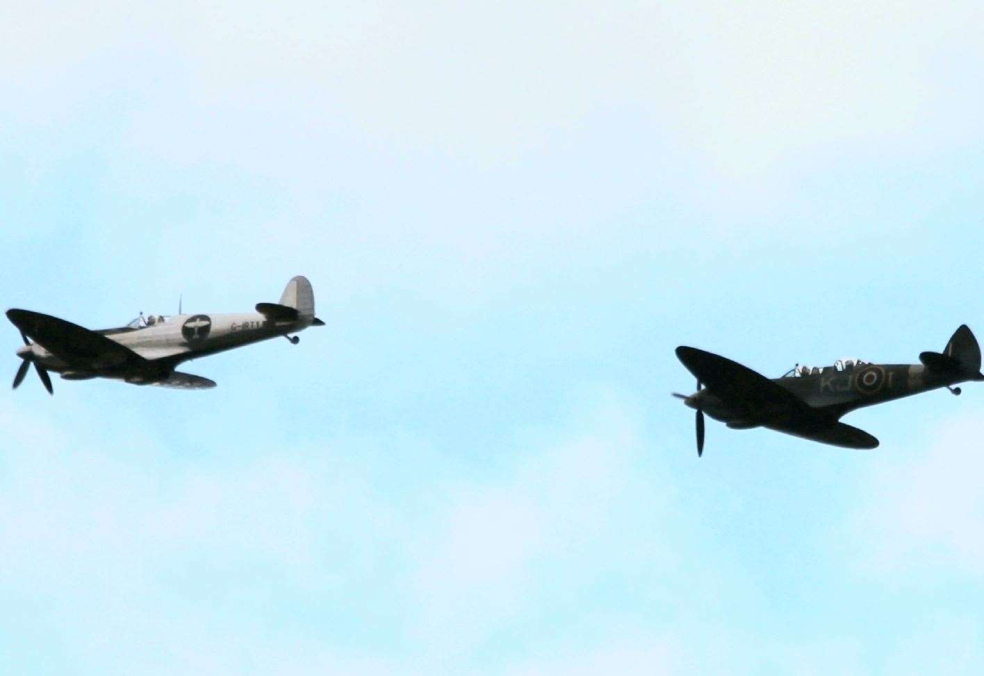 The pair of Spitfires in the air above Aviemore.