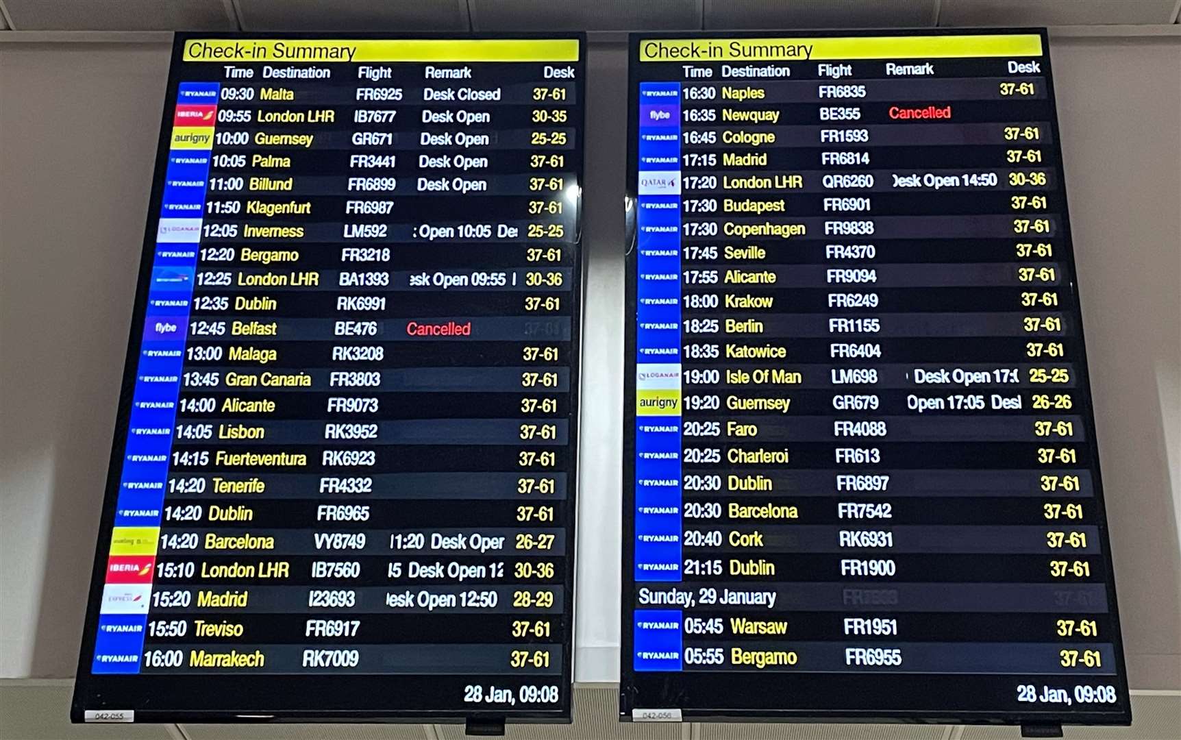 The departure boards at Manchester Airport showing two cancelled Flybe flights (Peter Byrne/PA Wire)