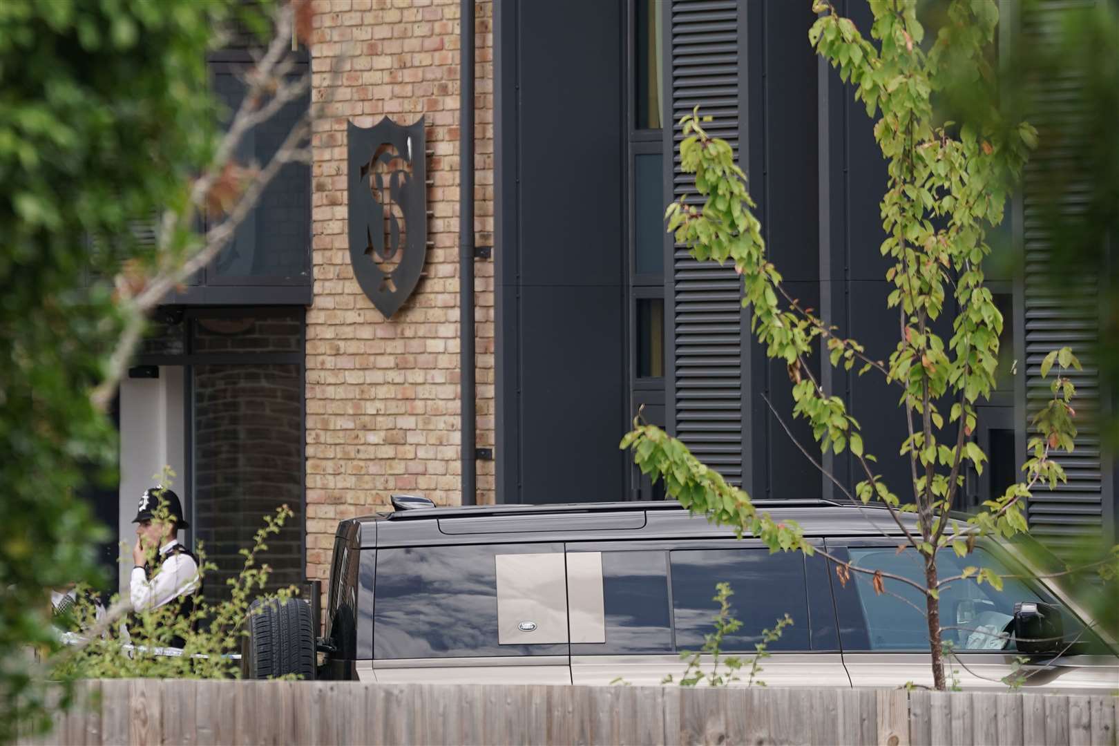 A Land Rover Defender could be seen inside the school’s grounds following the incident (Victoria Jones/PA)
