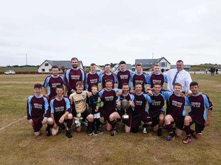 The victorious Invergordon Social Club team with the Pattison Cup.