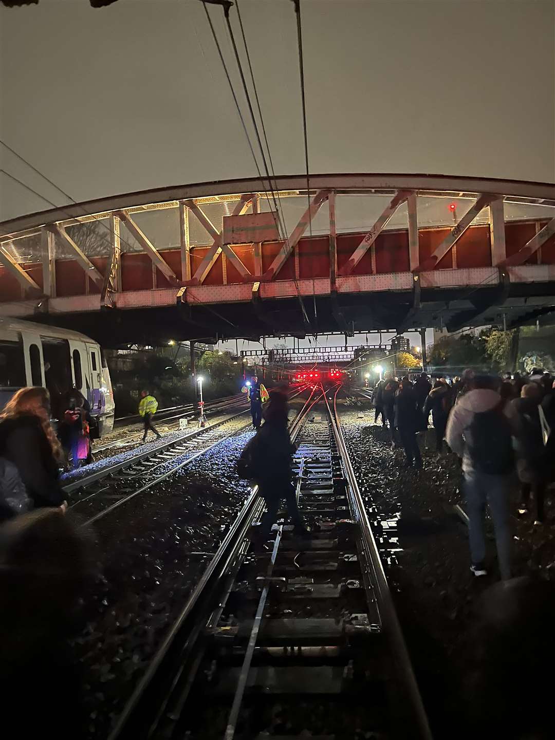 Passengers being evacuated onto the track in west London (Laura Bentley/PA)
