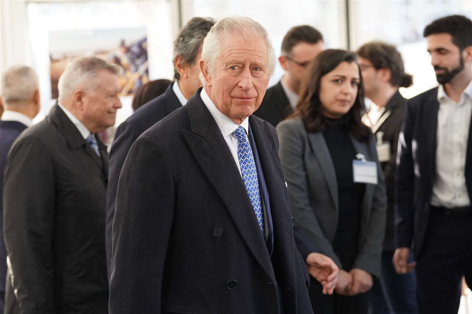 The King talks to members of the Syrian diaspora community after officially launching Syria’s House, a temporary Syrian community tent in Trafalgar Square, central London (Stefan Rousseau/PA)