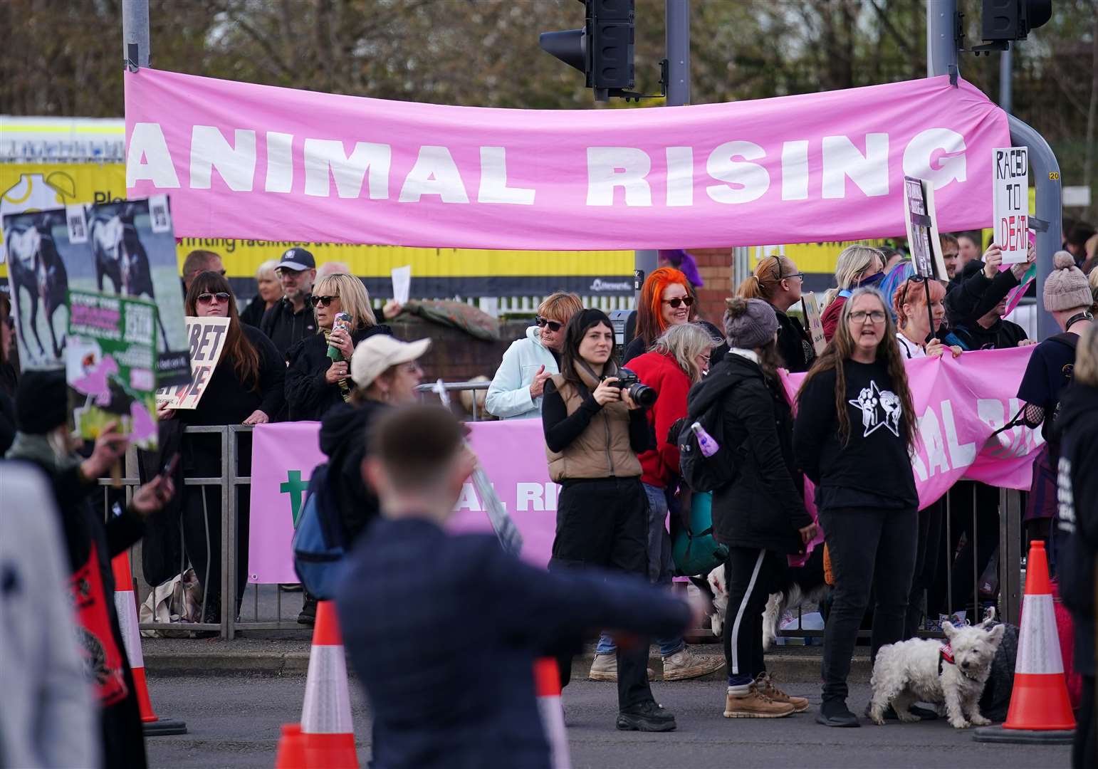 Animal Rising activists outside the gates (Peter Byrne/PA)