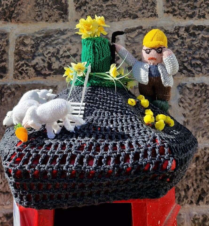 The Showfield Postbox Topper created by Nairn Wool Shop.