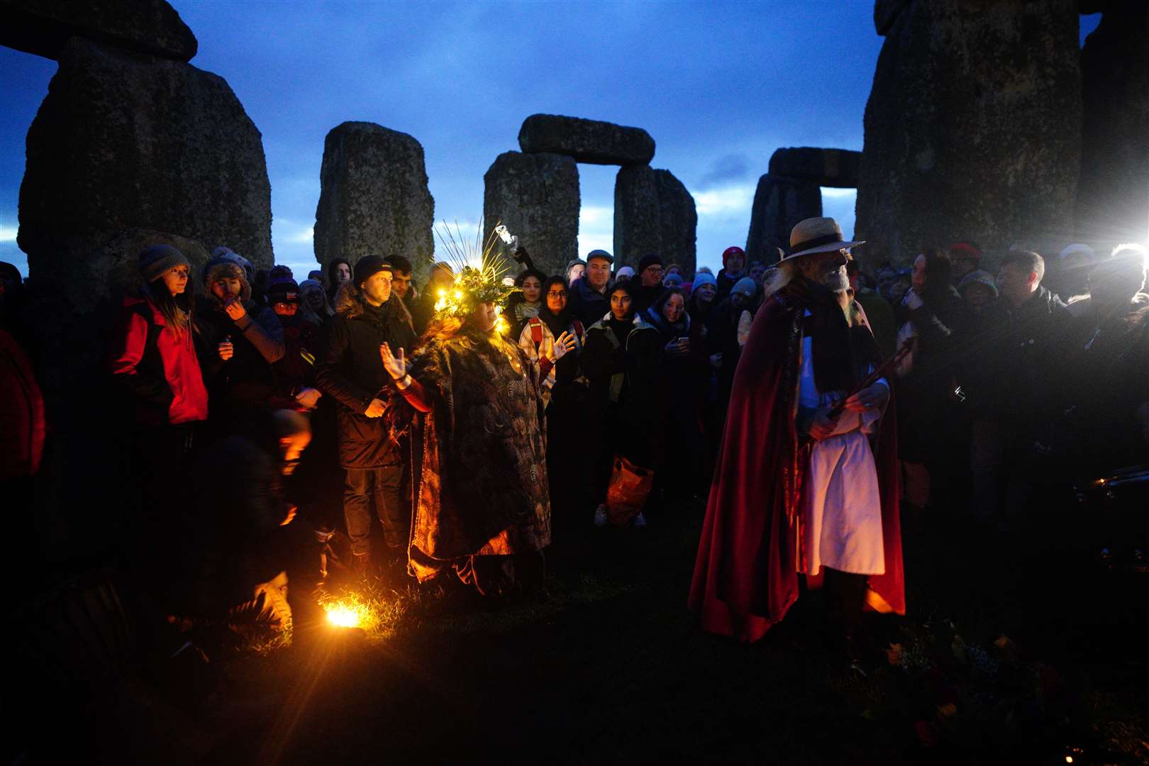 Many people visit Stonehenge annually for the winter solstice celebrations (Ben Birchall/PA)