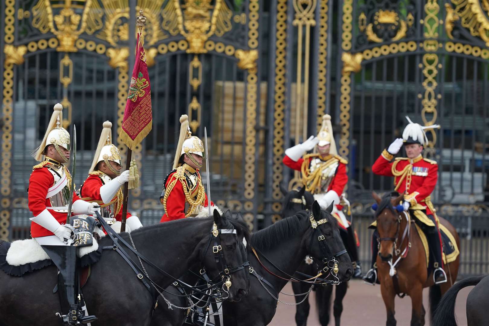 Lifeguards from the Household Cavalry outside Buckingham Palace ahead of the State Opening of Parliament (Steve Parsons/PA)