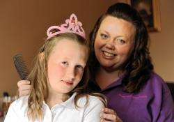 Rosie Fraser gives nine-year-old Sophie Forbes the Pampered Princess Parties’ treatment. Picture Gary Anthony